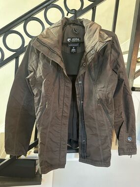 Kuhl women's Brown Raincoat with hidden hood